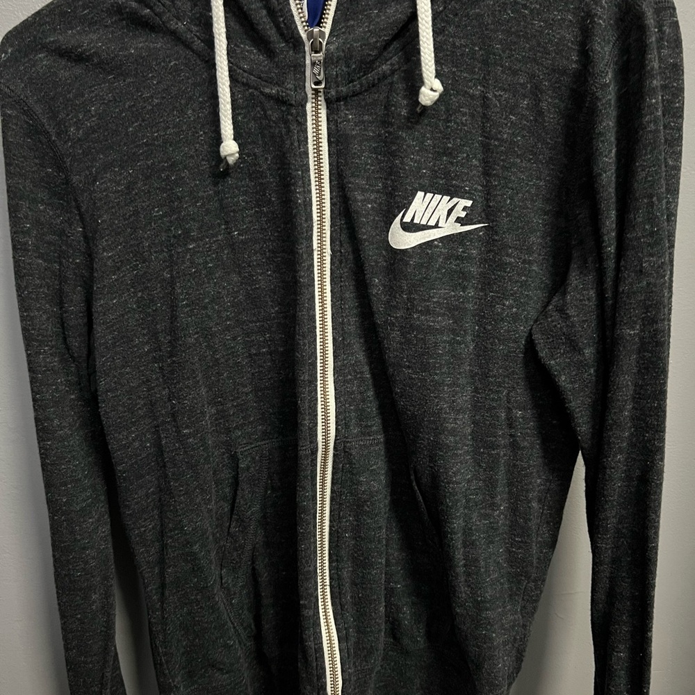 Nike zip up hoodie. Women’s size medium.